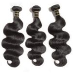 Four bundles of 10-30 Inch Body Wavy Virgin Brazilian Hair #1B Natural Black displayed on a white background.