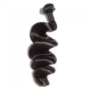 A single strand of 10-30 Inch Loose Wavy Virgin Indian Hair #1B Natural Black extension isolated on a white background.