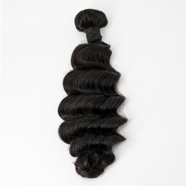 A single, tightly coiled, 14-26 Inch Ocean Wavy Virgin Brazilian Hair #1B Natural Black hair extension on a white background.